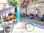 Tricycles and fruit market to Templo de San Francisco de Asís, Ayacucho, Peru.