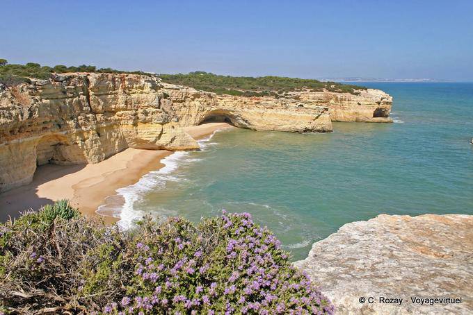 Sandy beach below the cliffs, Algarve - Portugal