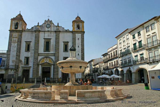Giraldo Square, fountain and church of Santo Antao, Evora - Portugal