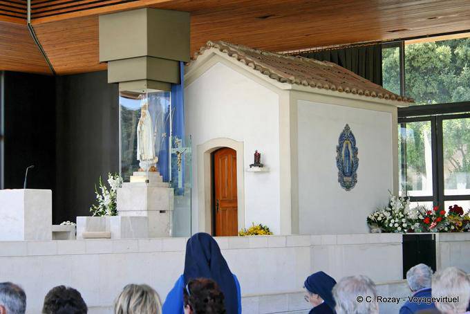 Prayer in the Chapel of Apparitions, built in 1919, Fátima - Portugal