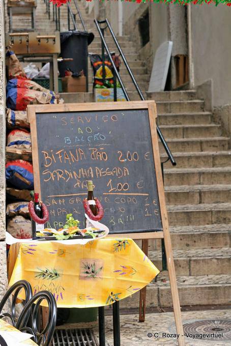 Sardinia assada for 1 €, Alfama, Lisbon - Portugal