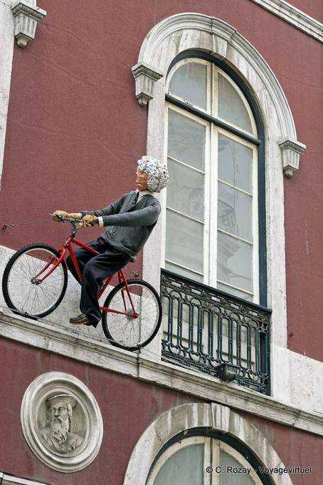 A bike on the front of Trindade Theatre, Chiado, Lisbon - Portugal