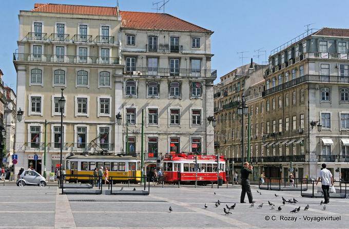 Trams yellow and red, Rossio, Lisbon - Portugal