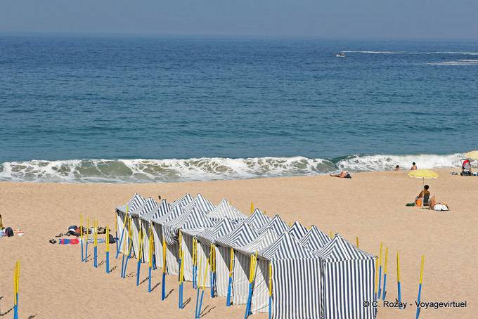 The ocean and beach shelters, Nazaré - Portugal