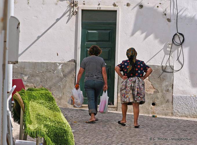 Back racing and traditional dress, Nazaré - Portugal