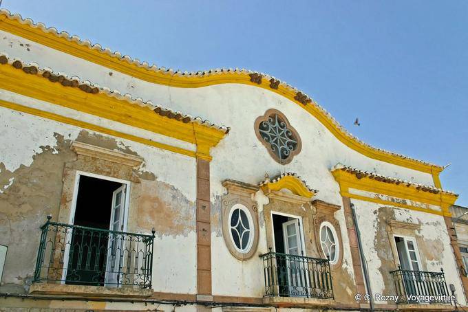 Balconies on decrepit facade, Tavira - Portugal