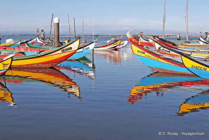 Reflections of moliceiros, port Torreira - Portugal
