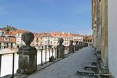The city works from the forecourt of the monastery, Alcobaça, Portugal.