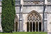 The Manueline cloister, view from the garden, Batalha, Portugal.