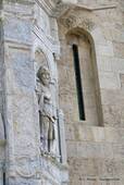 Statue outside for recess, Coimbra cathedral, Portugal.