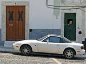 Estremoz, the grandmother and the car, largo Don Dinis, Portugal.