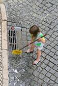 The small sweeper, Bairro Alto, Lisbon, Portugal.