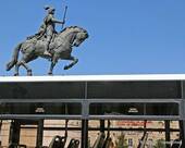 The rider on the roof of the bus, statue of John I, Praça da Figueira, Lisbon, Portugal.