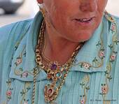 A woman who loves jewelry, Sitio, Nazaré, Portugal.