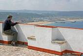 The entrance of the port of Nazaré, view of Sitio Promontory, Portugal.