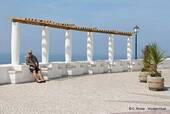 The portico of the sea and the man in the beret, Sitio, Nazaré, Portugal.