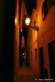 Lighting an alley at night, Nazaré, Portugal.