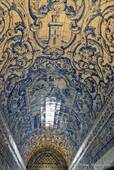 The vault of the church entirely covered with beautiful tiles, Nazaré, Portugal.