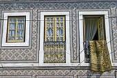 A facade covered with typical tiles, Nazaré, Portugal.