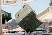 The fountain in the cube, the terrace of Ribeira Square, Porto, Portugal.
