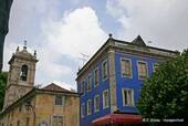 Sintra, the steeple of the church of São Martinho and the blue house, Portugal.