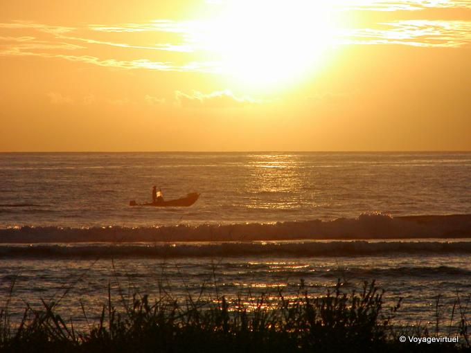 Sunset and boat crossing to Saint-Leu - Reunion