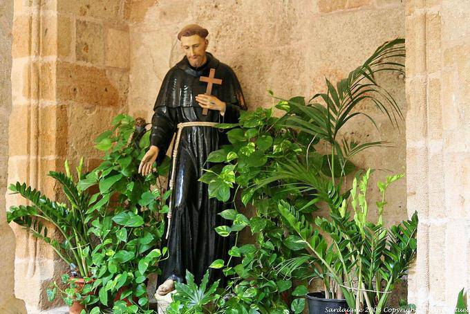 Monk statue at the cross, cloister of St. Francis, Alghero - Sardinia