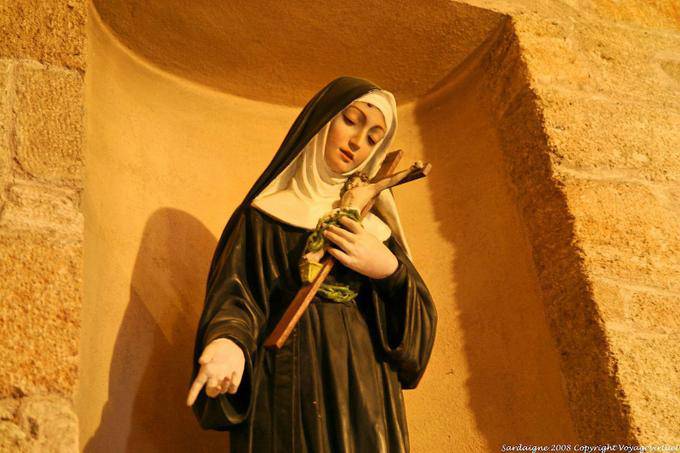 Alghero, San Francesco, mystical worship statue in a niche of Campanile - Sardinia