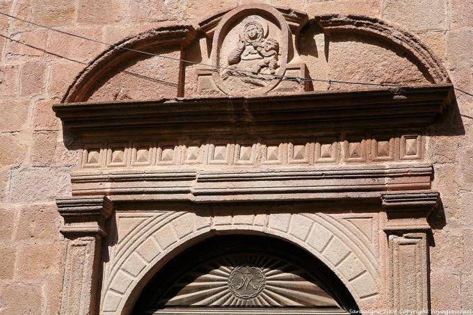 Bosa, Corso Vittorio Emanuele II, Madonna and Child carved in a medallion - Sardinia