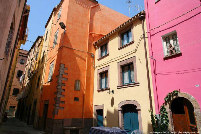 Bosa, Vicolo della Scuda, cheerful colors facades - Sardinia