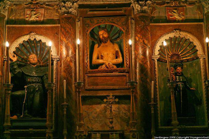 Castelsardo, close up of the statues of an altar - Sardinia