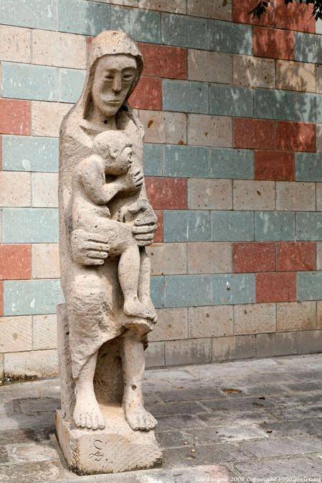 Fordongianus child statue in front of the San Pietro Apostolo church - Sardinia