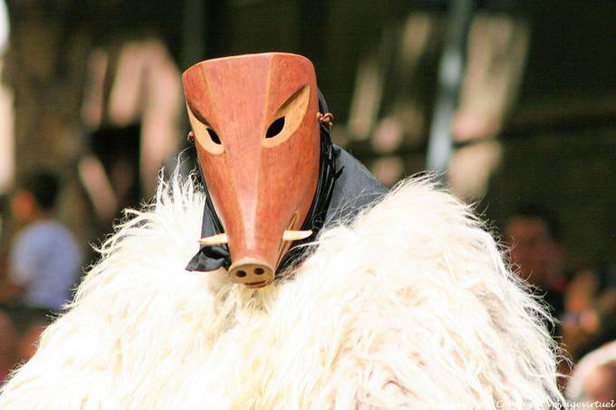 Nuoro, Festa del Redentore, sos Merdules Bezzos of Otzana, wild boar mask - Sardinia