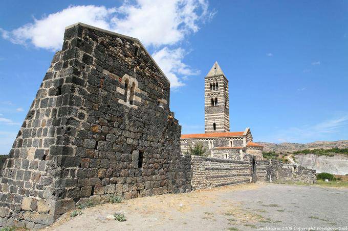 Basilica of the Holy Trinity of Saccargia, view from the ruins of the monastery - Sardinia