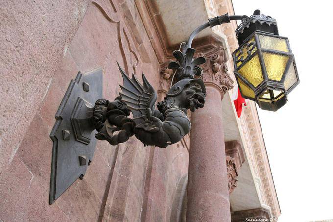 A lantern-shaped winged monster Piazza Italia, Palazzo Giordano Apostoli, Sassari - Sardinia