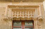 Architectural detail of the top of a window, Palazzo Machin, Alghero, via Umberto, Sardinia.