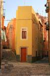 Bosa, narrow house in street corner, Sardinia.