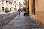 Bosa, Corso Vittorio Emanuele II, the elders and the cobbles, Sardinia.