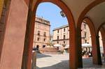 Bosa, under the arcades of Piazza Costituzione, Sardinia.