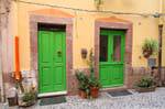 Bosa, via Santa Croce, green doors, Sardinia.