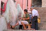 Castelsardo, fishing nets repair, Sardinia.