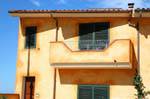 Luogosanto, via San Trano, facade colors of bread, Sardinia.