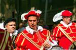 Nuoro, Festa del Redentore, musician red suit, Sardinia.
