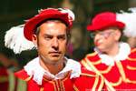 Nuoro, Festa del Redentore, musician red dress green eyes, Sardinia.