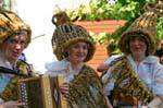 Smile and accordion, Nuoro, Festa del Redentore, vegetable traditional dress, Sardinia.