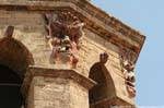 Monstrous head carved in a corner, Cathedral of Santa Maria, Oristano, Sardinia.