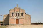 Padria, pink facade of the church, Sardinia.