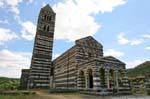 Basilica della Santissima Trinita di Saccargia, built in black basalt and white limestone, Sardinia.