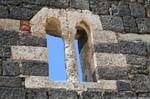 Basilica della Santissima Trinita di Saccargia a monastery column window, Sardinia.