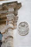 Sassari, Palazzo del Barone Uzzini, medallion and column detail, Sardinia.